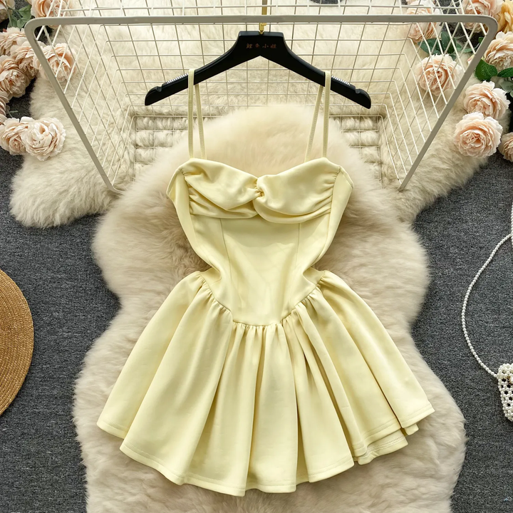 Felicity Pastel Yellow Sleeveless Pleated Mini Dress