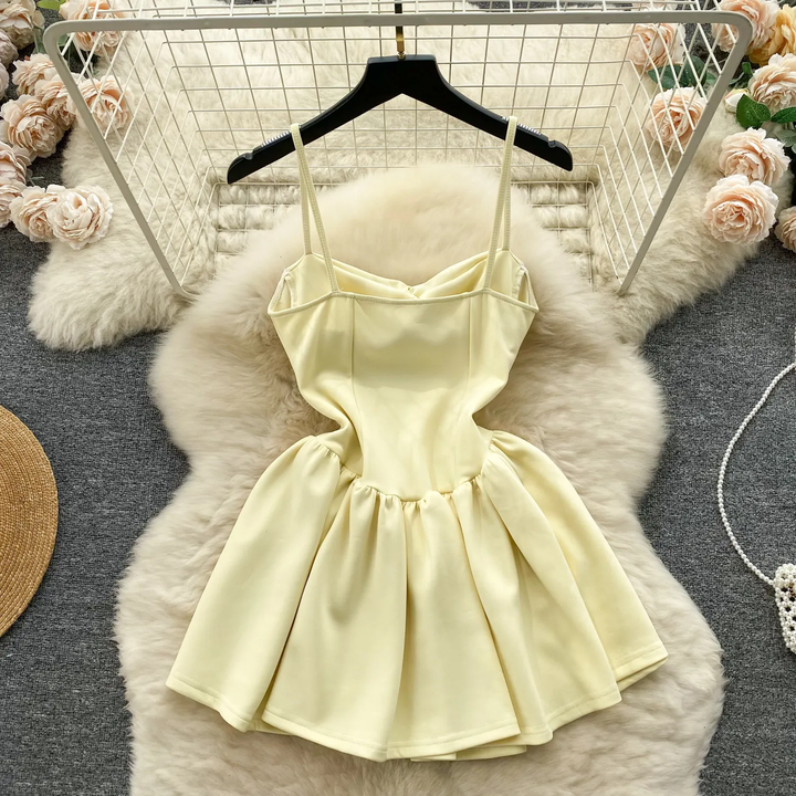 Felicity Pastel Yellow Sleeveless Pleated Mini Dress