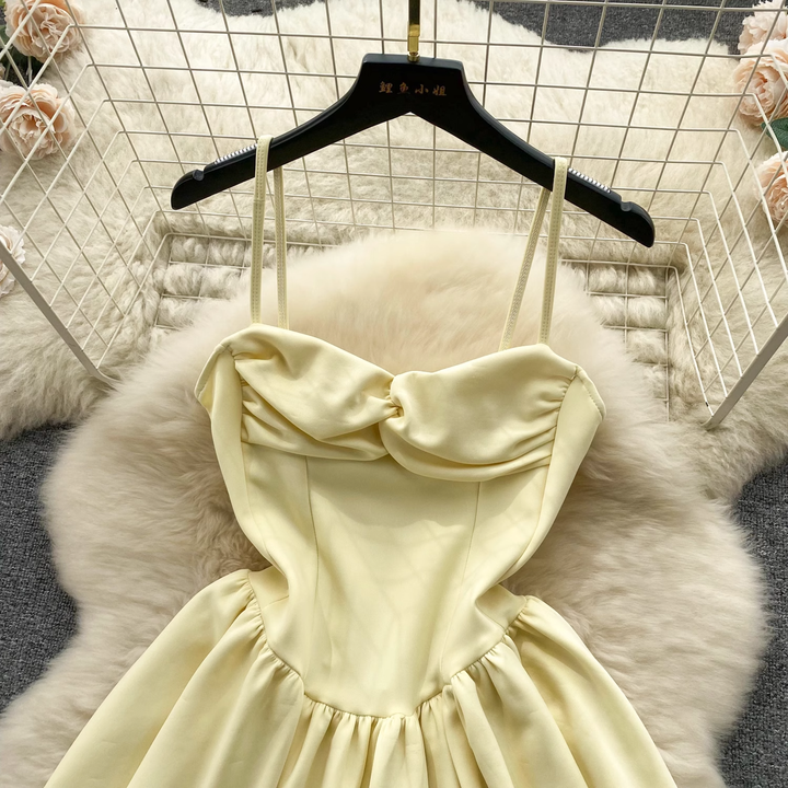 Felicity Pastel Yellow Sleeveless Pleated Mini Dress