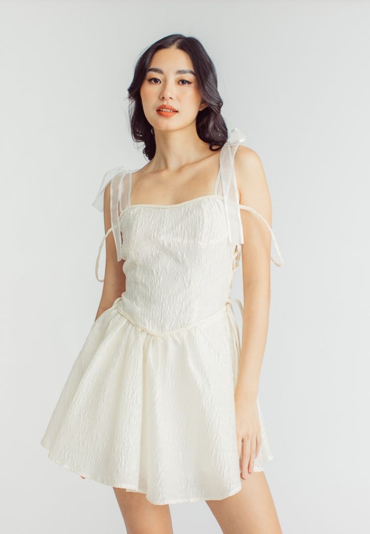 Elle Cream Textured Square Neck Sleeveless Self Tie Strap Pleated Mini Dress