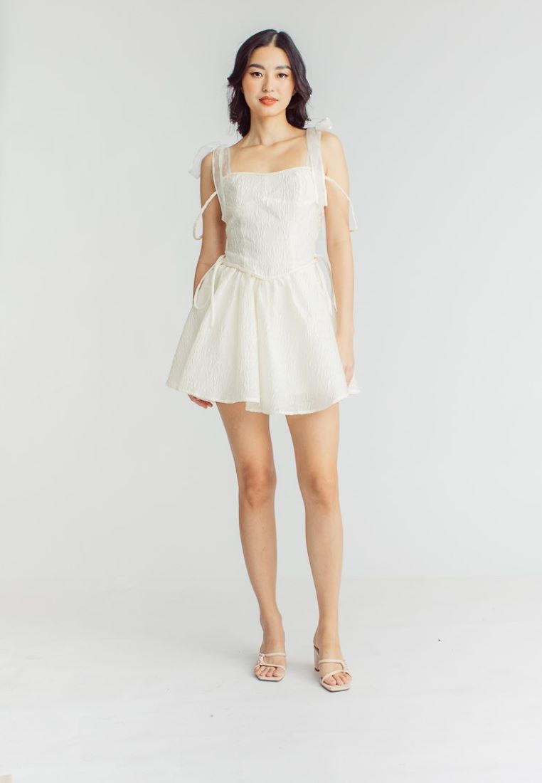 Elle Cream Textured Square Neck Sleeveless Self Tie Strap Pleated Mini Dress