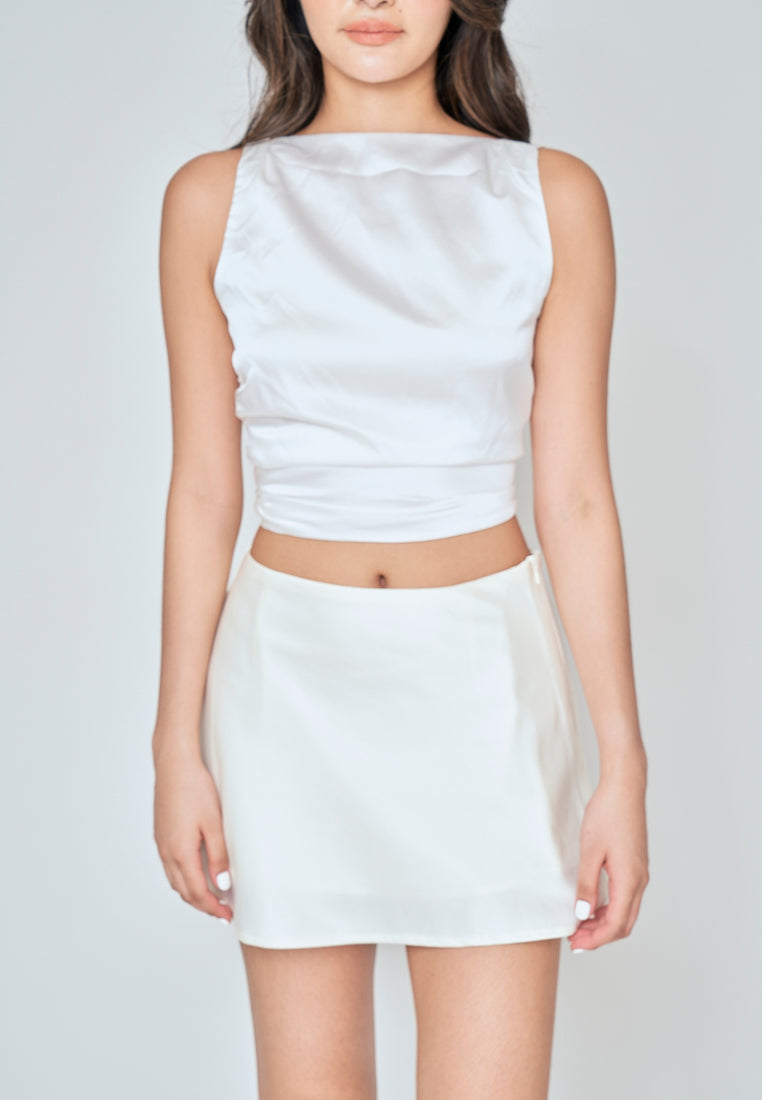 Xela White Crew Neckline Open Tie Back Sleeveless Top