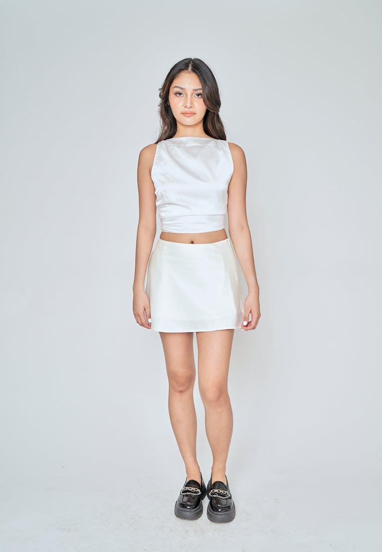 Xela White Crew Neckline Open Tie Back Sleeveless Top