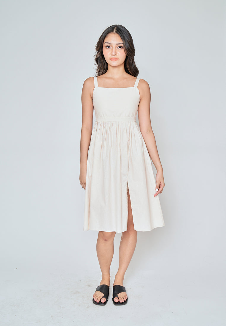 Yoshie Off White Sleeveless Zipper Back Pleated Side Slit Midi Dress