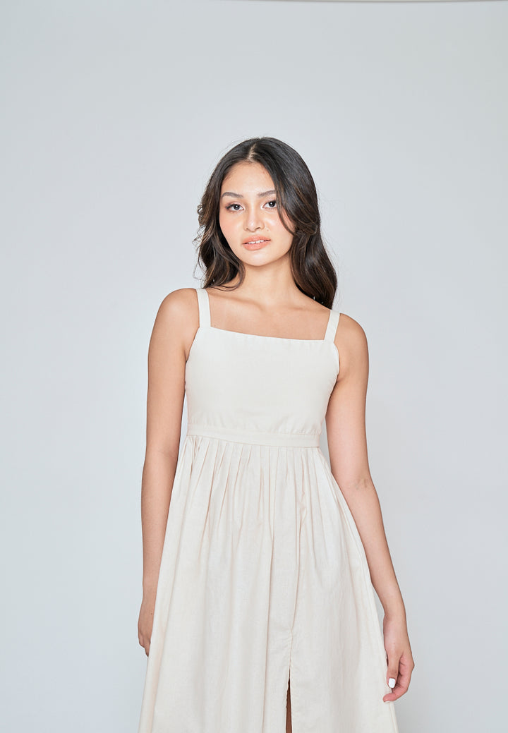 Yoshie Off White Sleeveless Zipper Back Pleated Side Slit Midi Dress