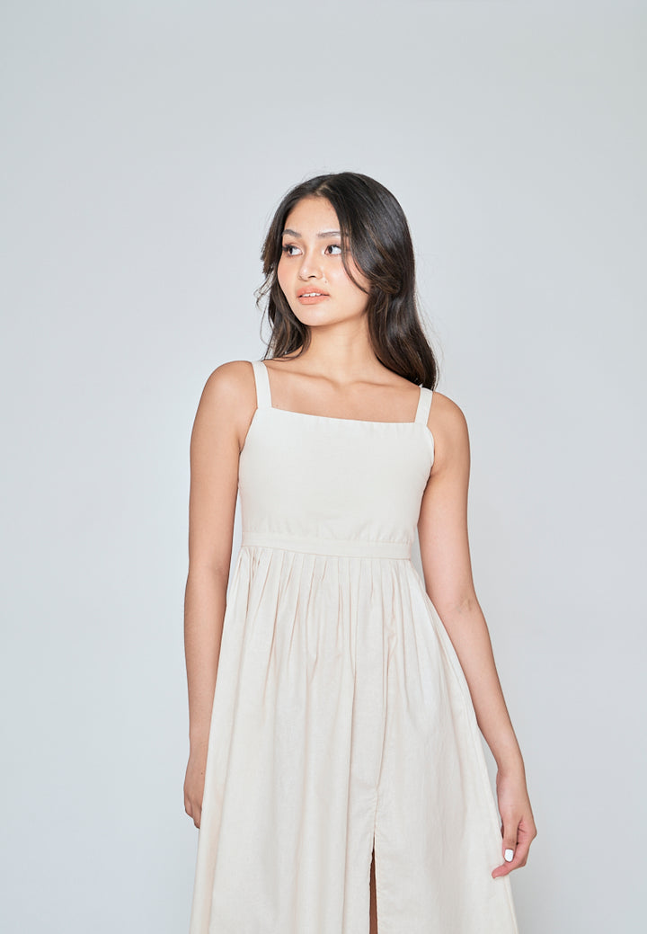Yoshie Off White Sleeveless Zipper Back Pleated Side Slit Midi Dress