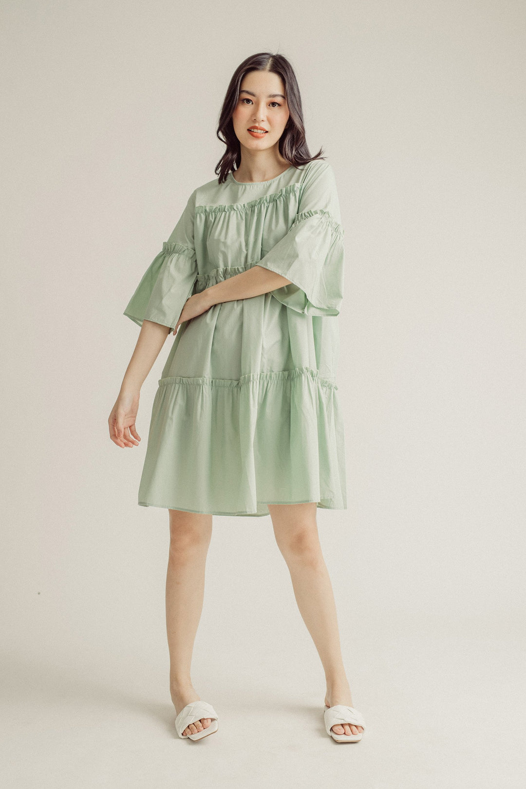 Stormi Sage Round Neck Ruffle Babydoll Mini Dress