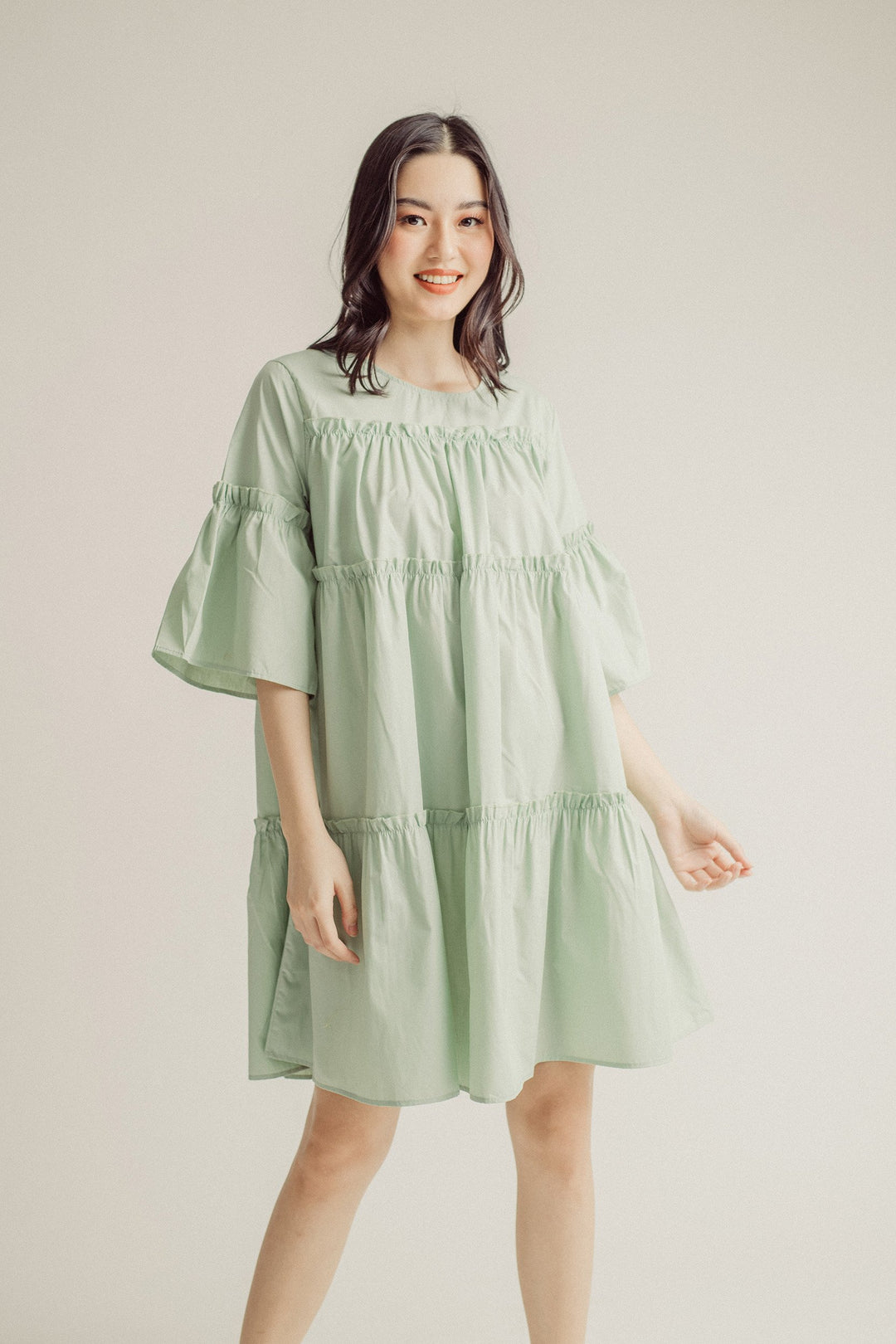 Stormi Sage Round Neck Ruffle Babydoll Mini Dress