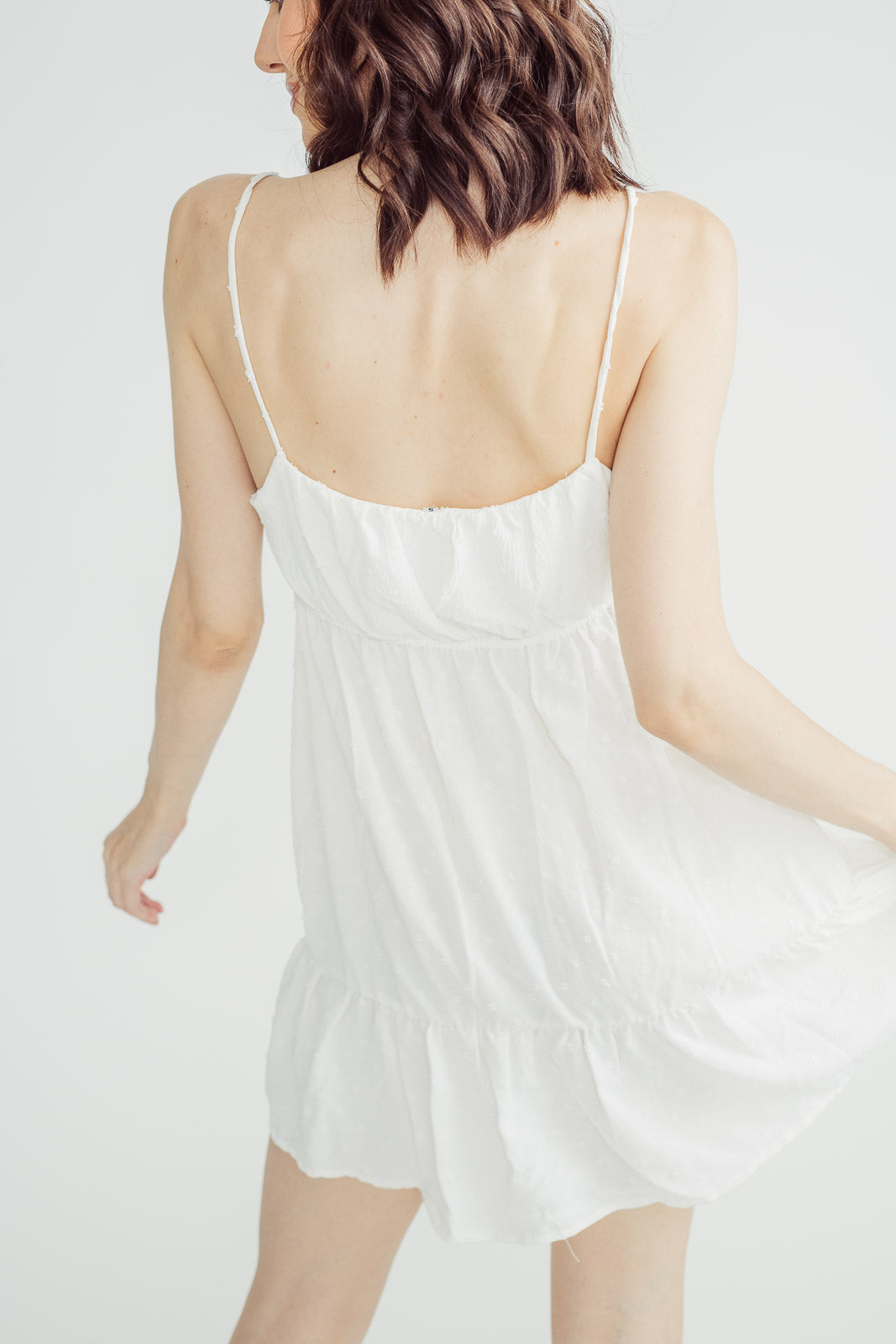 Liza White Sleeveless Elastic Waist Ruffle Hem Mini Dress with Slit