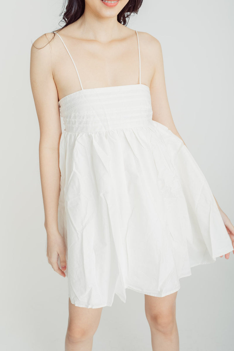 Ensley White Pleated Top Sleeveless Long Bow Back Mini Dress